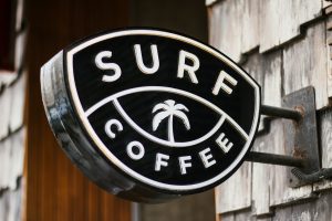 close view of Surf Coffee signage